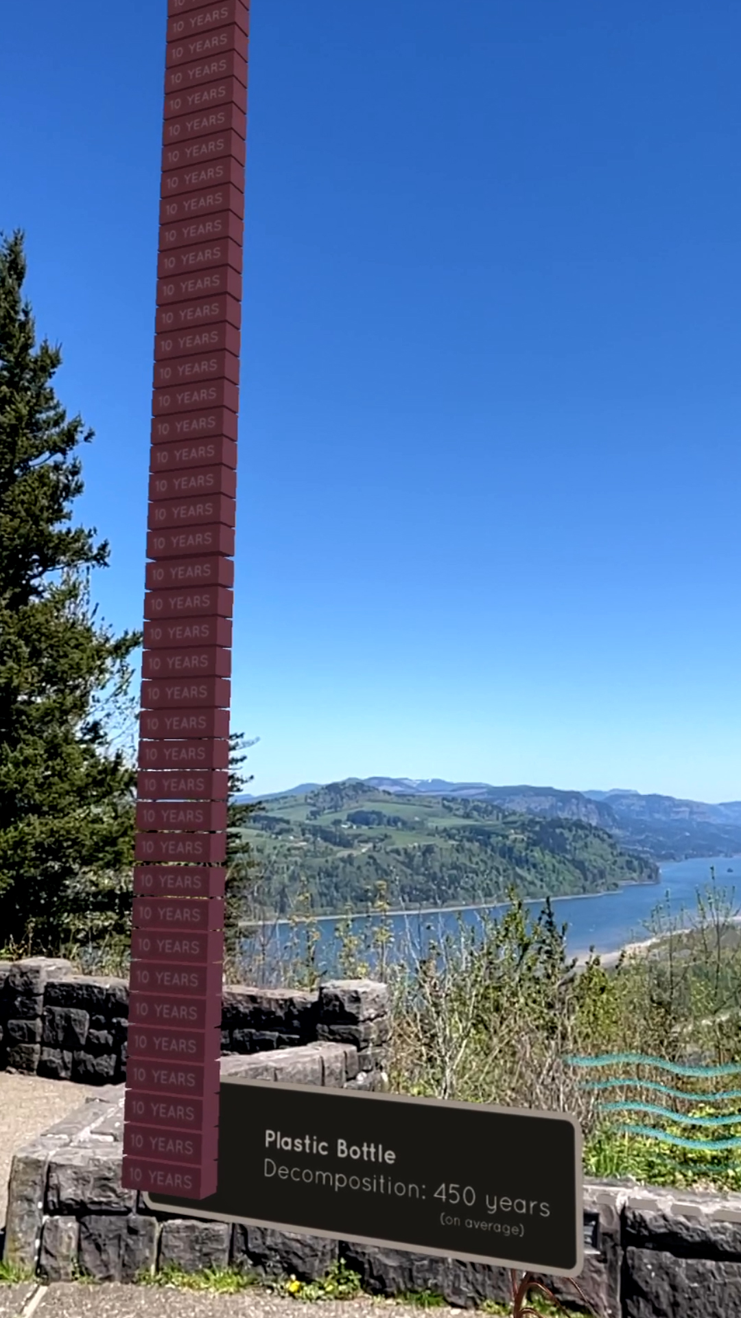 Earth Day AR — milk carton decomposition timeline showing 1000-year lifespan of plastic